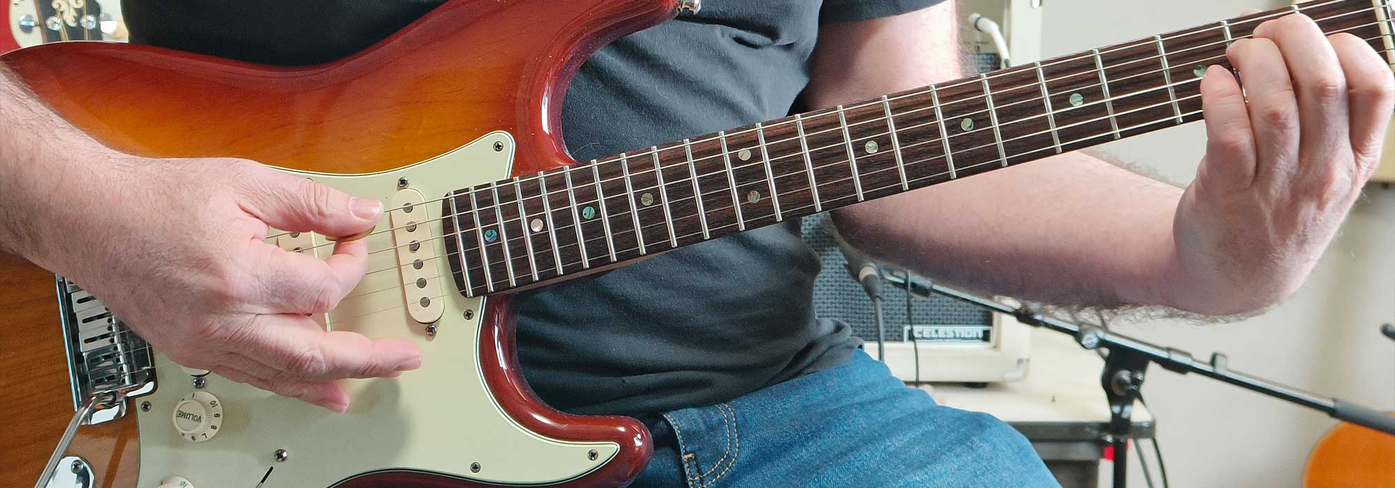 Hoe houd je je gitaar vast?